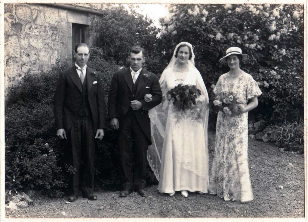 Marriage photograph of Robert Struthers and Helen Strang Semple, 7 June 1934. Left to right: William Lindsay, Robert, Helen, Agnes Dickie Semple. Photograph probably taken at East Law Farm, Carluke.